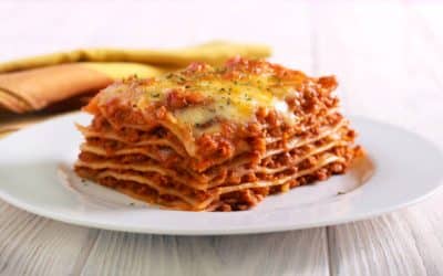 Imagine a dish that's as comforting as a warm hug where layers of pasta rich sauce and creamy cheese