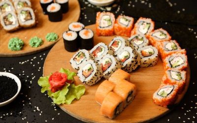 Sushi is a popular Japanese food that usually features vinegared rice combined with different toppings or fillings.