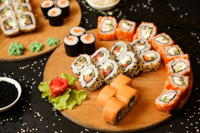 Sushi is a popular Japanese food that usually features vinegared rice combined with different toppings or fillings.