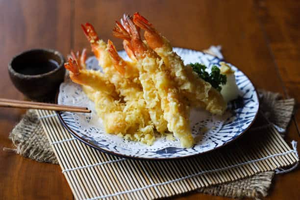 Tempura is a Japanese dish of lightly battered and deep-fried seafood or vegetables